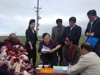 中国残联副主席吕世民一行调研共和县残疾人工作