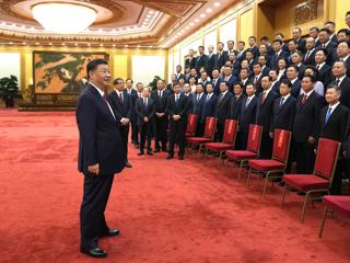 习近平会见全国优秀县委书记