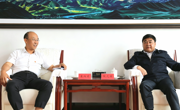 熊元来与中国五冶集团上海分公司副总经理袁旭东一行座谈